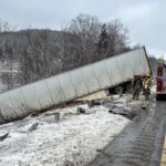 Tractor Trailer Goes Partially Over Embankment